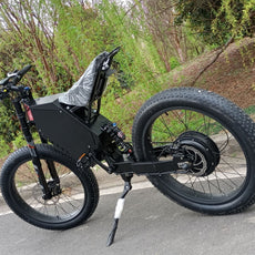 72v 3000w stealth bomber ebike with fat wheel, black frame, motorcycle seat, kke front fork on private road